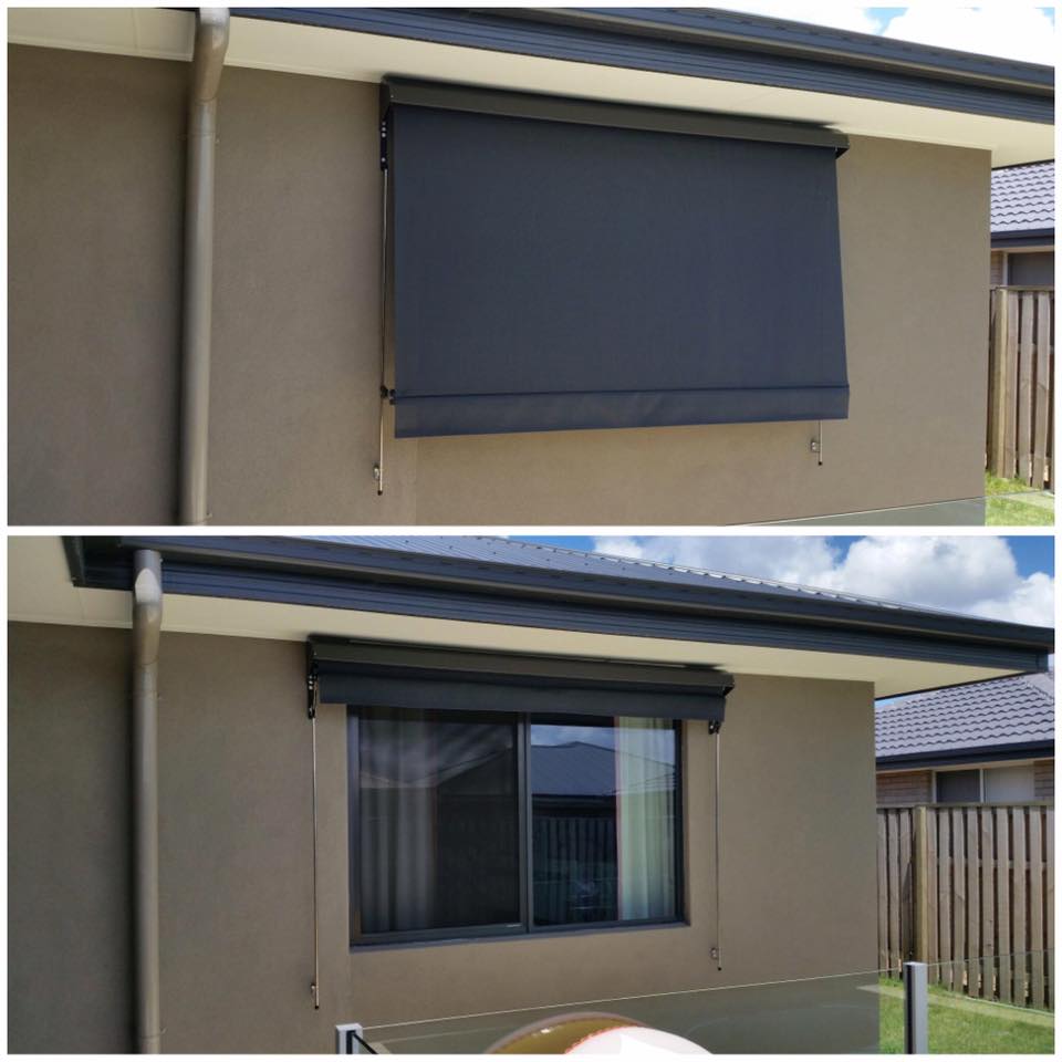 A two-panel comparison shot of a house window, showing a dark grey outdoor roller blind fully lowered in the top image and fully rolled up in the bottom image.